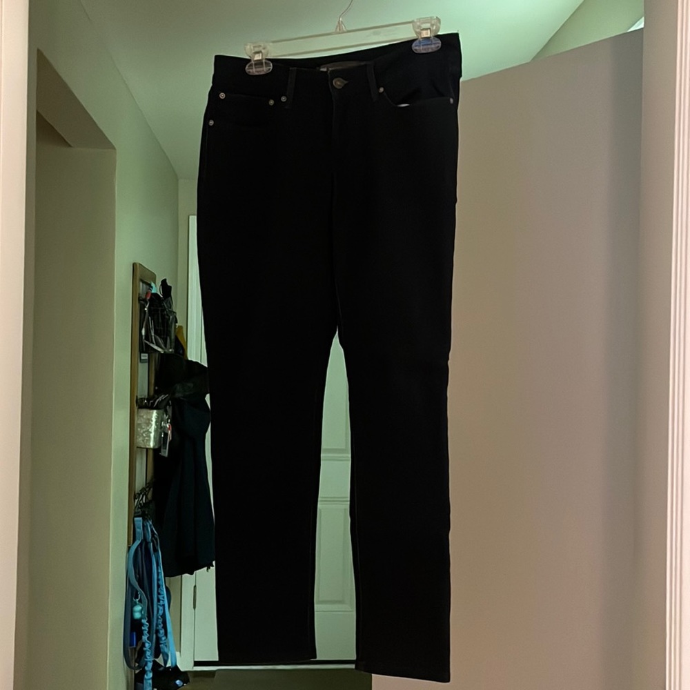 Dark wash mid rise skinny jeans